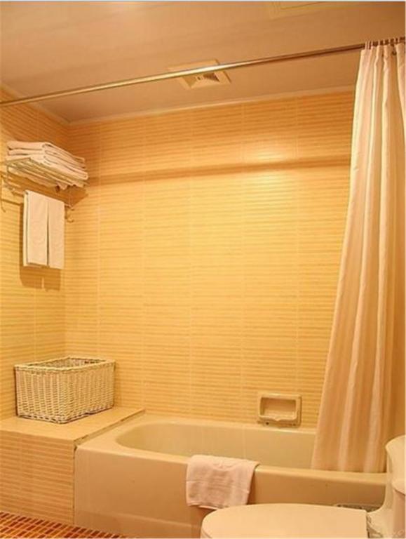Donghai Grand Hotel Циндао Номер фото
